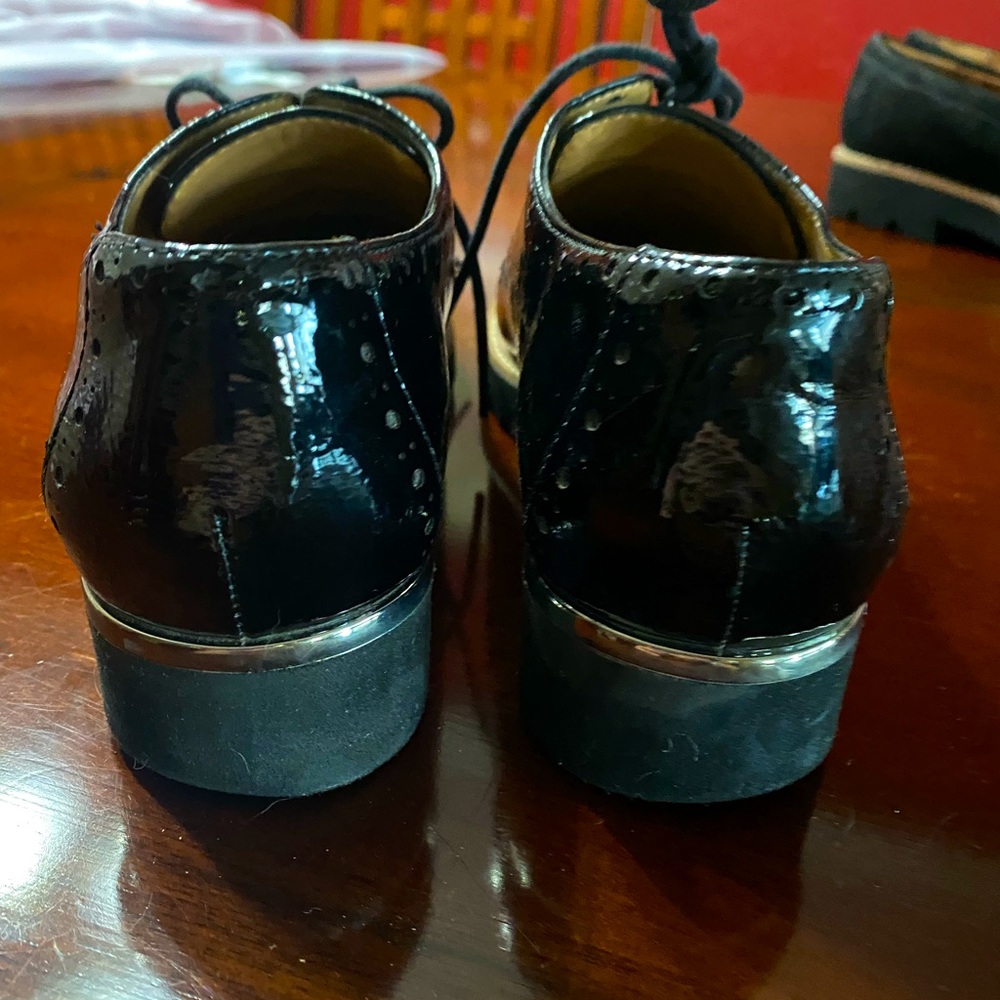 Franco Sarto womans Wingtip 6.5.  Worn a few times. Left shoe toe has a blemis